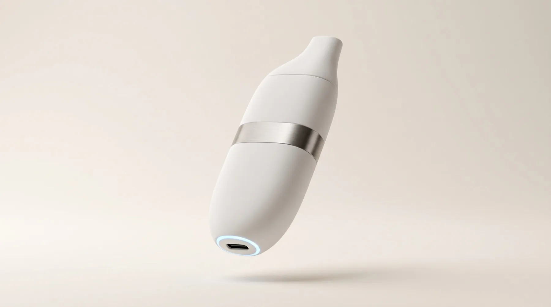 The AC-1 device floating over a soft studio background